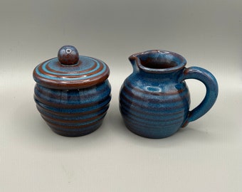 RACKLIFFE POTTERY Sugar & Creamer. Blue Hill, Maine. Blue and Brown Glazed Redware.