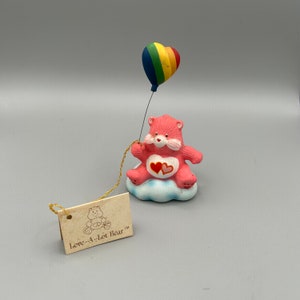 Vintage American Greetings Care Bear Figurine. Love-A-Lot Bear with Rainbow Heart Balloon. Designers Collection. 1984. With Original Tag.