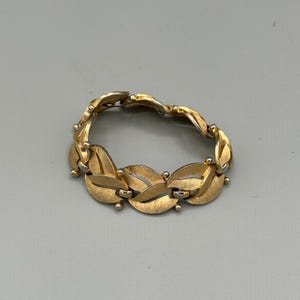Vintage Crown Trifari Link Bracelet. Brushed Gold Tone Leaf Design. 7 1/4 Inch Length.