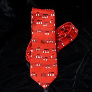 White Skulls with Black Musical Notes and a Beautiful Red Vintage Tie