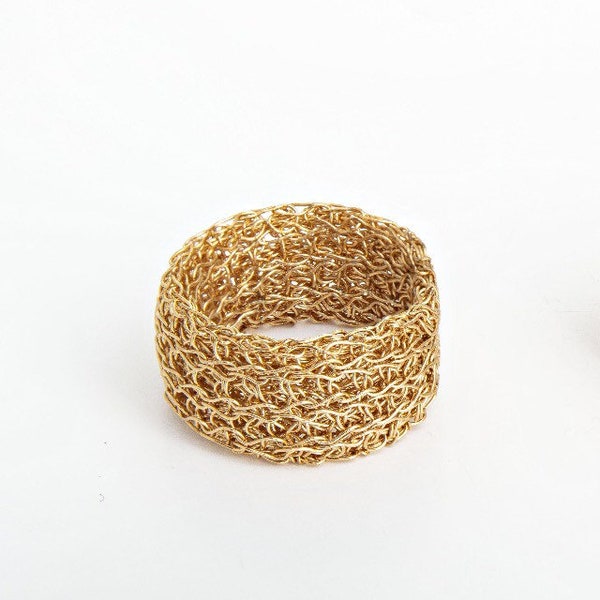 Hand crocheted wire ring made by Juno James gold/silver