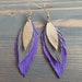 see more listings in the Triple feather earrings section