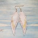 see more listings in the Double feather earrings section