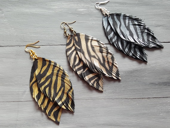 Exotic feather earrings. Leather feather earrings. Large feather earrings. Boho earrings. Animal print earrings. Bohemian earrings. Safari.