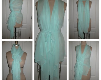 Abrigo de múltiples funciones que puede ser usados 20 maneras diferentes de verano a invierno, de la playa a la oficina!