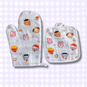 May include: A set of two blue oven mitts with a white checkered pattern and cartoon animal designs. The mitts feature a variety of animals, including bears, rabbits, and dogs, wearing hats and holding objects. The mitts are perfect for protecting your hands while cooking or baking.