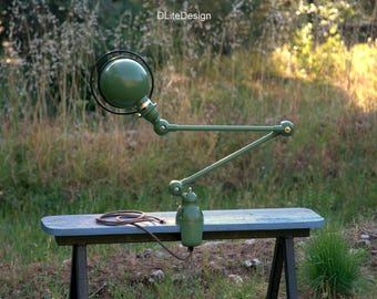 Olive green JIELDE lamp with clamp and Fresnel lens. 1970
