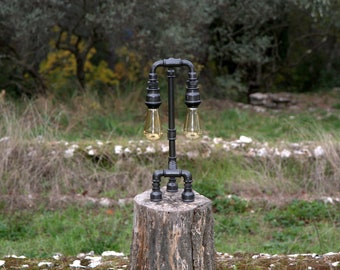 Steampunk lamp Art Deco style, assembly of cast iron fittings.