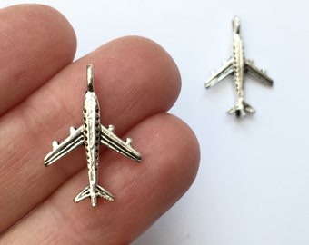 8 Aeroplane charms antique silver tone TT18