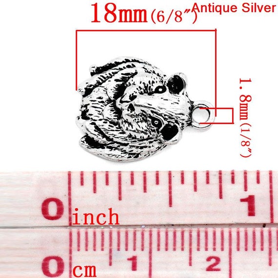 4 Kettle bell charms antique silver tone SP203