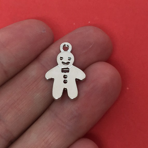 BULK 50 Bone charms silver tone A300