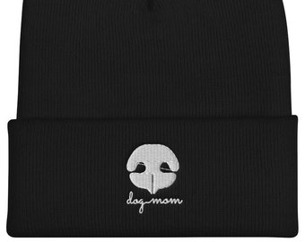 May include: Black beanie with a white embroidered dog nose and the text "dog mom" underneath.