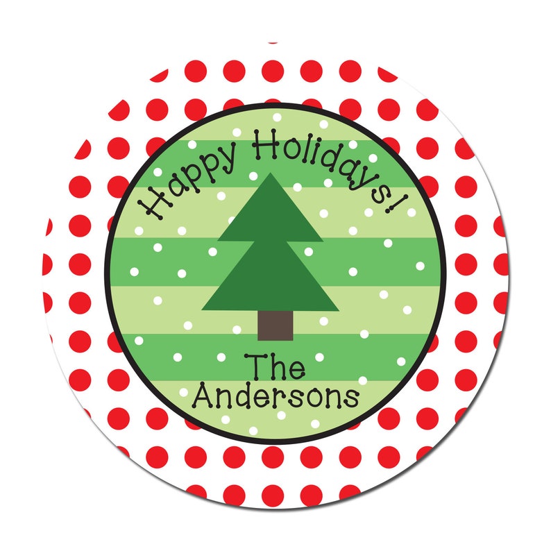May include: A round, white sticker with red polka dots. The center of the sticker has a green and white striped background with a green Christmas tree and white snowflakes. The text "Happy Holidays!" is written in a black cursive font around the tree. The text "The Andersons" is written in black below the tree.