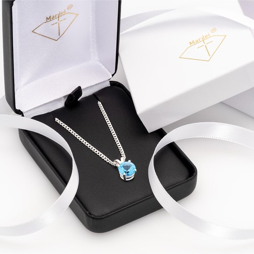Vivid Natural Swiss Blue shops Topaz pendant from Brazil. Handmade Premium silver pendant. 8mm round gemstone. 2.2+ctw. Chain options.