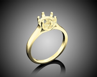 May include: A gold ring setting with a round center stone setting. The setting has six prongs and a smooth band.