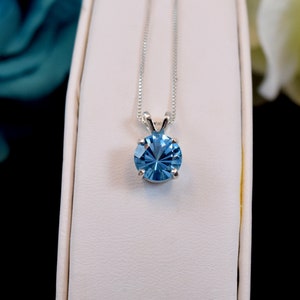 Absolutely Amazing Gem! 8mm Round, Concave Cut Natural Swiss Blue Topaz necklace from Brazil. Premium Sterling Silver, Pendant or chain.