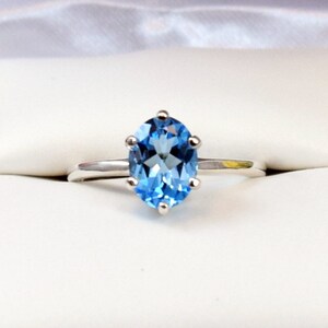 Sparkling Swiss Blue! Classic 8x6mm, Oval, Natural, Blue Topaz Solitaire Sterling Silver Ring. Gorgeous AAA Color! Sizes 5-12 (US)
