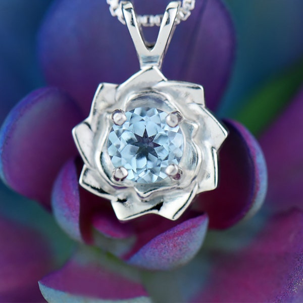 Light Blue Lotus Flower Pendant Necklace. Natural, Sky Blue Topaz gemstone set in handmade premium silver flower pendant. Chain options.