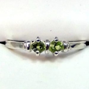 Two-Gemstone Peridot Band. Lively Green! 2 Round Natural Peridot Gemstones set in 925 Sterling Silver.