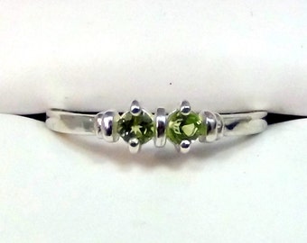 Two-Gemstone Peridot Band. Lively Green! 2 Round Natural Peridot Gemstones set in 925 Sterling Silver.