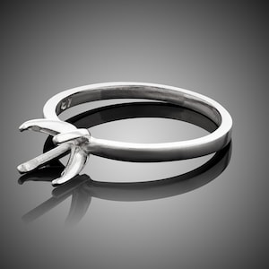Premium Light Sterling Silver, 4-prong, 6mm round, ring setting. Cast in Oxygen-free environment. Polished and ready for gemstone