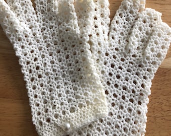Vintage short white crocheted Gloves with pearls buttons
