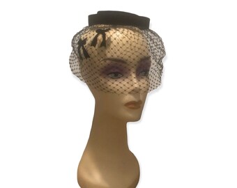 Vintage Black Cocktail hat 1950’s, face netting, Bow hat, Midcentury fashion