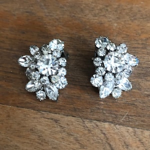 Vintage 1950’s rhinestone earrings, marked made in Austria, clip on