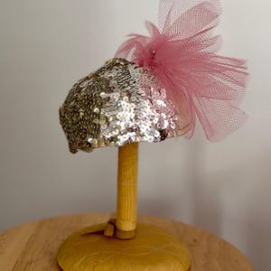 Vintage 1930’s 1940’s era petit cap style cocktail hat, pink net tulle bow, silver shimmering sequins Paillettes