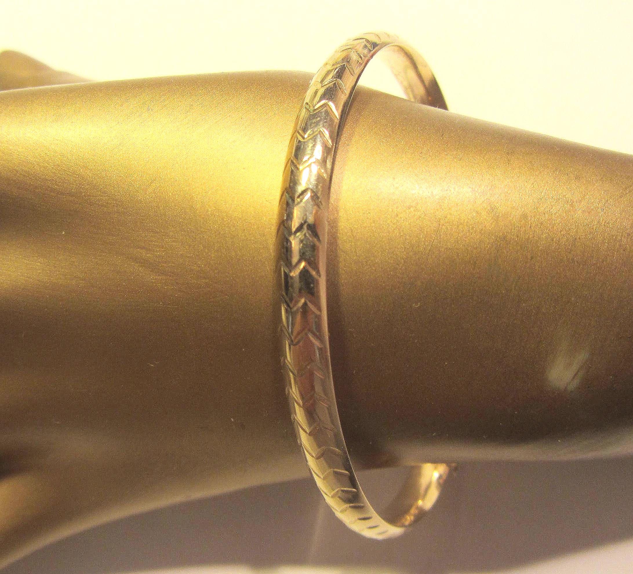Bracciale rigido placcato oro, motivo 'zig-zag', fino a 27 cm