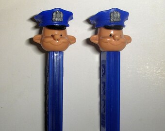 Vintage Policeman A Pez dispenser with snap-on cap, blue stem. Near mint, vintage Pez, Austria 2 6 stem, 1970s Pez, Policeman Pez