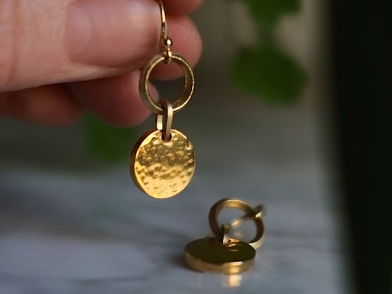 Gold hammered disc earrings