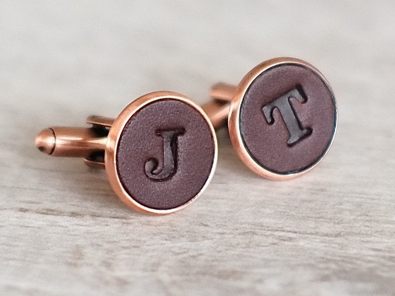 Pair of Personalised Leather Letter Cufflinks Copper and chocolate