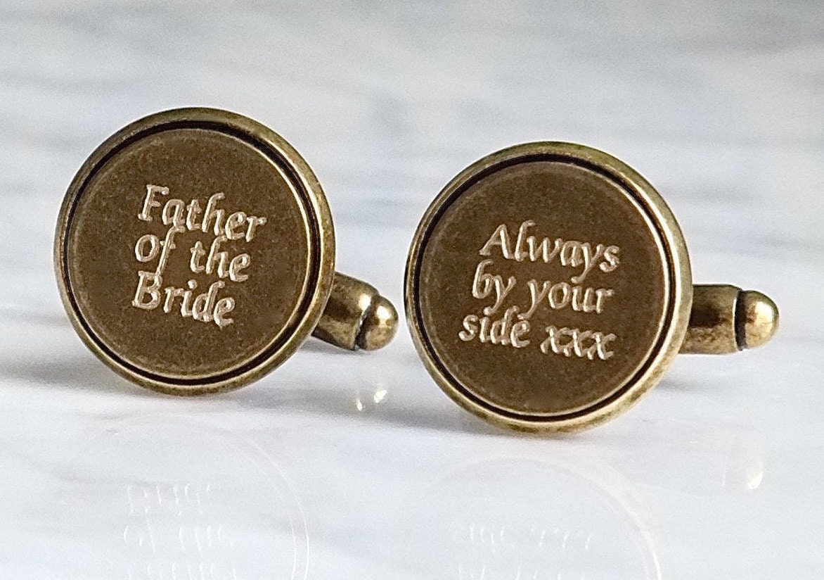 Pair Of Engraved Bronze Cufflinks