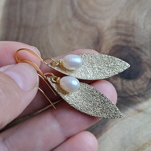 Pearl earrings Leaf earrings Sparkling earrings