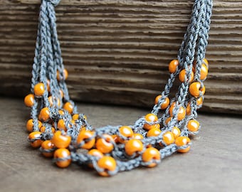 Crochet Necklace with yellow beads and gray cotton yarn