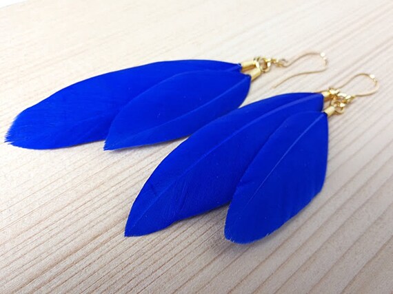 blue feather earrings