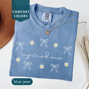 Registered Nurse Comfort Colors Shirt RN Graduation Gift Floral RN Nurse Tee Gift for Registered Nurse Coquette bow shirt Daisy floral tees