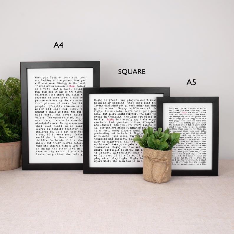 May include: Three framed prints with black frames and white backgrounds. The prints feature text in black font. A small potted plant in a burlap sack sits in front of the prints. The frames are labeled A4, Square, and A5.