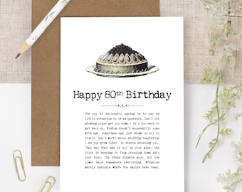 May include: A birthday card with the text "Happy 80th Birthday" in black font. The card features an illustration of a cake and a message about aging. A pencil, paper clips, and a brown envelope are also visible.