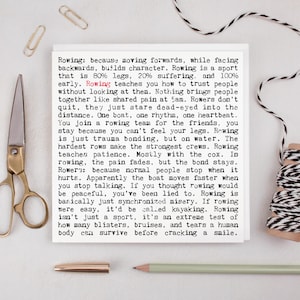 May include: A white card with black text about rowing, alongside gold scissors, paper clips, a pencil, and a metal pen holder. The text describes rowing as a sport that builds character and teaches trust.