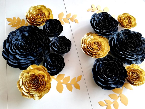 Black and gold paper flowers  Paper flowers, Giant paper flower backdrop, Paper  flower wall wedding
