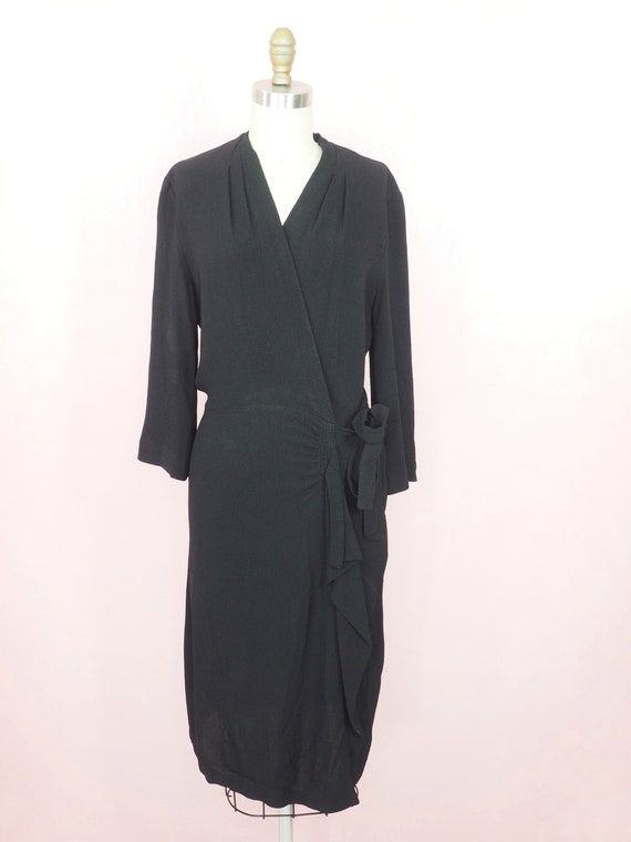 1940s faux wrap dress in black rayon (38”-28”