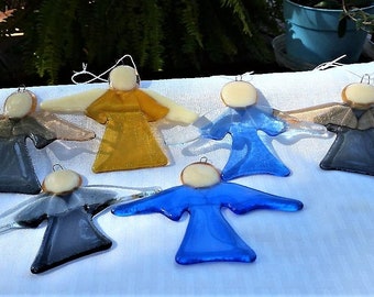 Handmade fused glass angel ornaments.