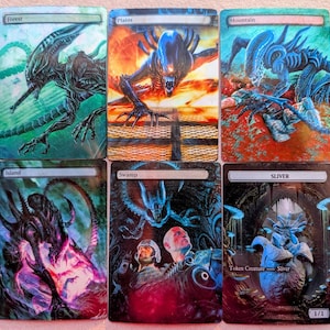 May include: Six custom Magic: The Gathering cards with Alien-themed artwork. The cards are labelled "Forest", "Plains", "Mountain", "Island", "Swamp", and "Sliver". Each card shows a different Alien creature in a unique, colourful scene.