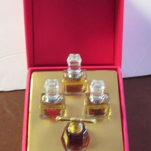 4 Piece Juicy Couture Travel Set Parfum Each .17 Fl Oz  5 ml