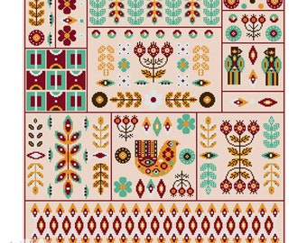 Op de afbeelding: Een kleurrijk kruissteekpatroon met een gestileerde vogel, bloemen en geometrische vormen. Het patroon is gemaakt van rode, oranje, gele, groene en blauwe draden.