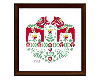May include: A cross-stitch pattern featuring two red Dala horses with yellow and green floral accents. The pattern is framed in a brown wood frame.