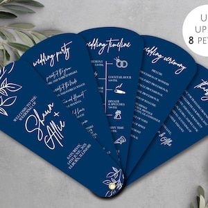 May include: Navy blue wedding fan with white script. The fan includes the wedding party details, timeline, ceremony details, and a thank you message. The fan is decorated with floral accents and the couple's names.