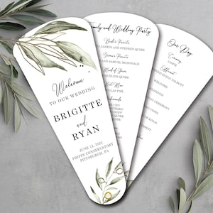 May include: A wedding program fan with a green and gold floral design. The front of the fan says "Welcome to our wedding, Brigitte and Ryan, June 12, 2022, Phipps Conservatory, Pittsburgh, PA". The back of the fan lists the wedding party and the order of events for the ceremony.